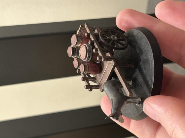 Same donkey with cart miniature at a different angle.